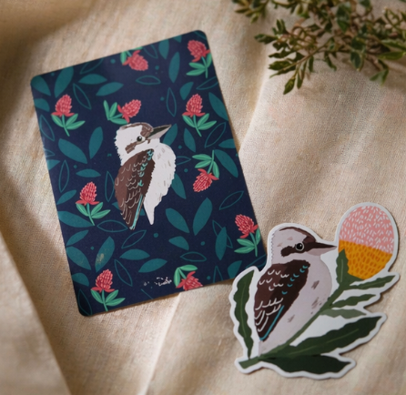 Fridge magnet with a kookaburra design on a floral background