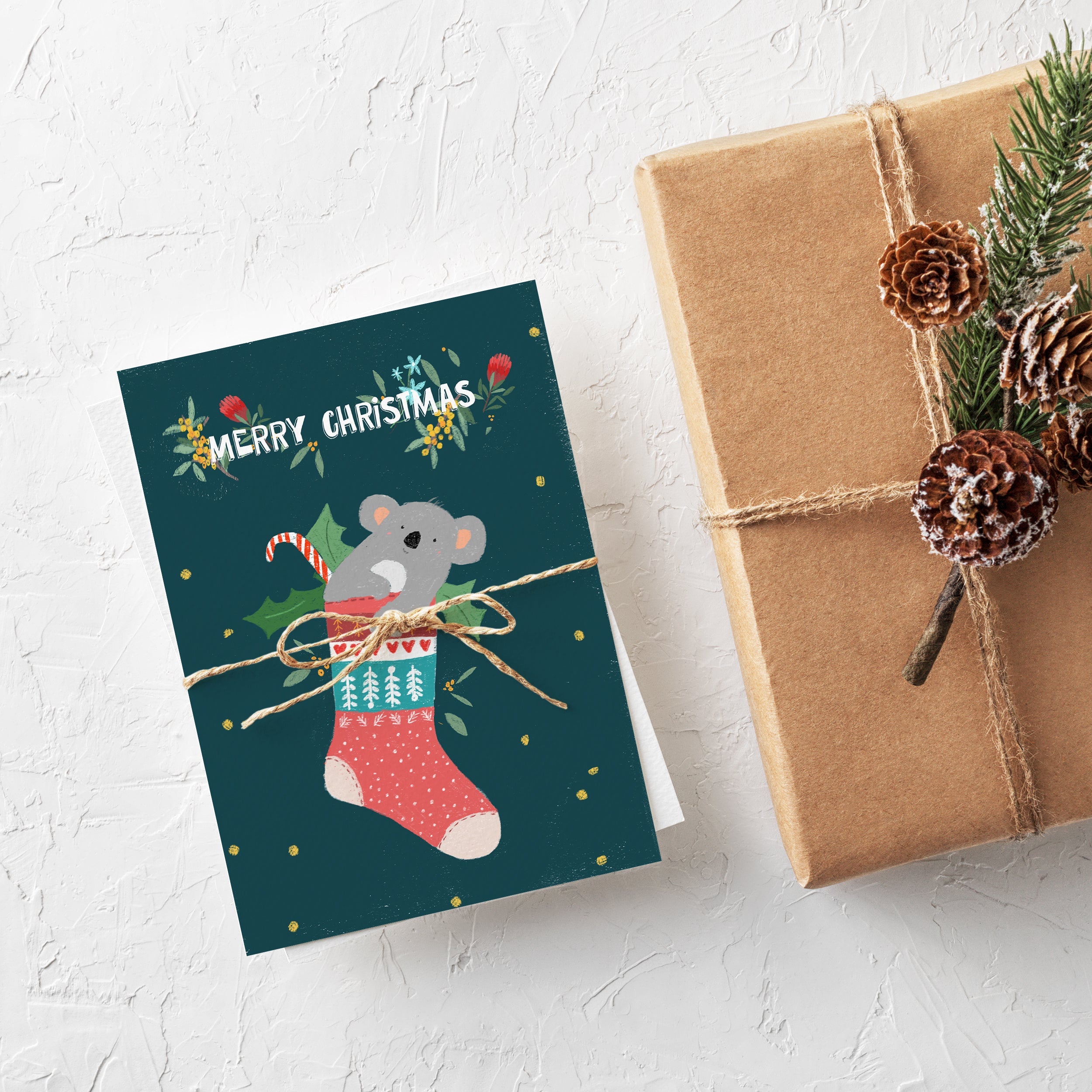 Christmas Stocking Koala Greeting Card – Australian Animal Christmas Card by Suki McMaster